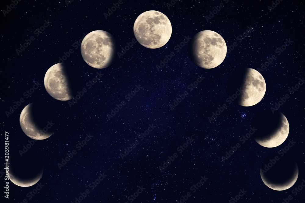 Fototapeta premium Phases of the moon over blue sky