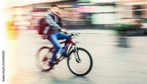 Fotografi Cyclist in motion blur