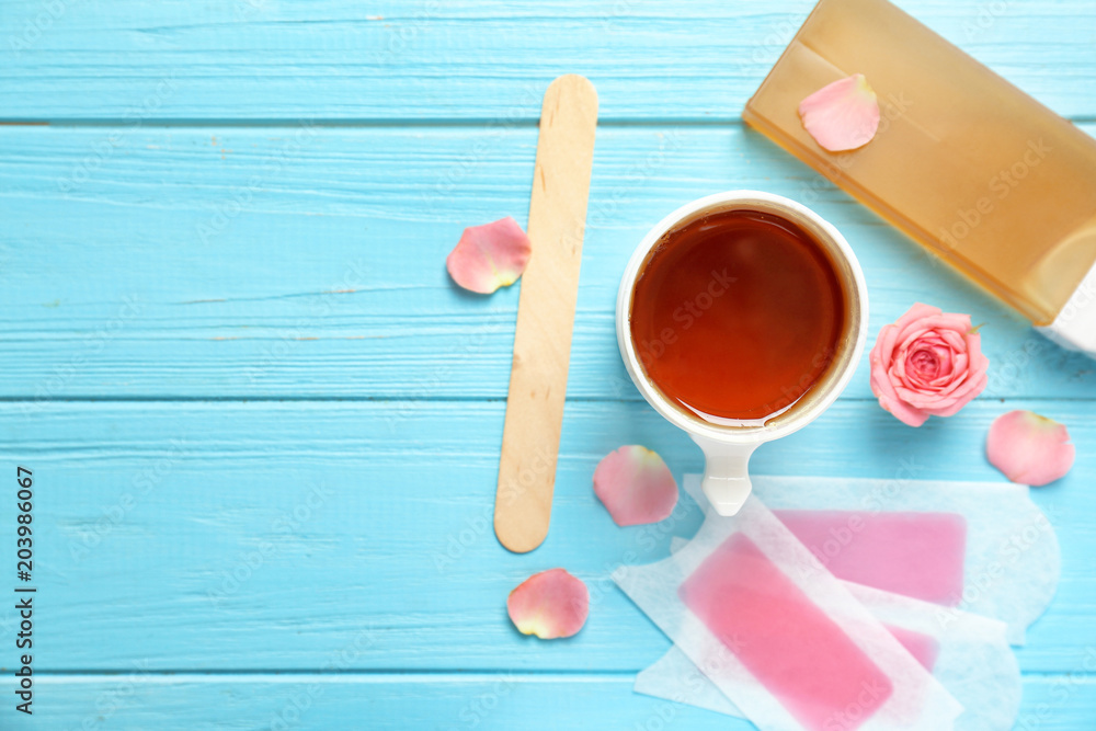 Set for epilation on wooden background, flat lay Stock Photo | Adobe Stock