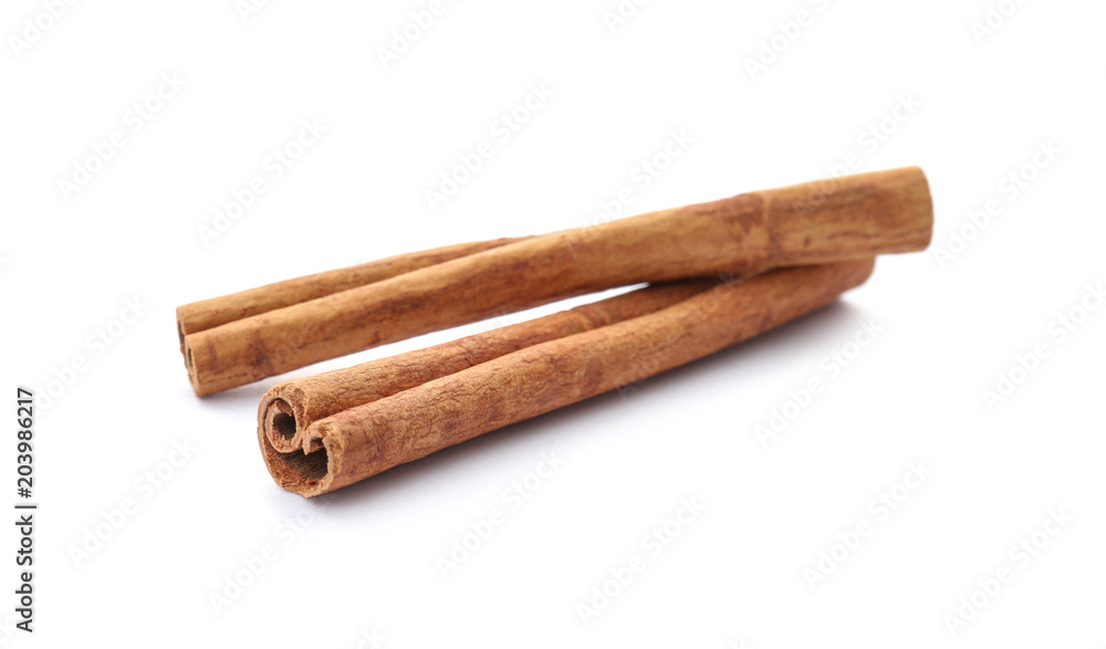 Aromatic cinnamon sticks on white background Aromatic cinnamon sticks on white background