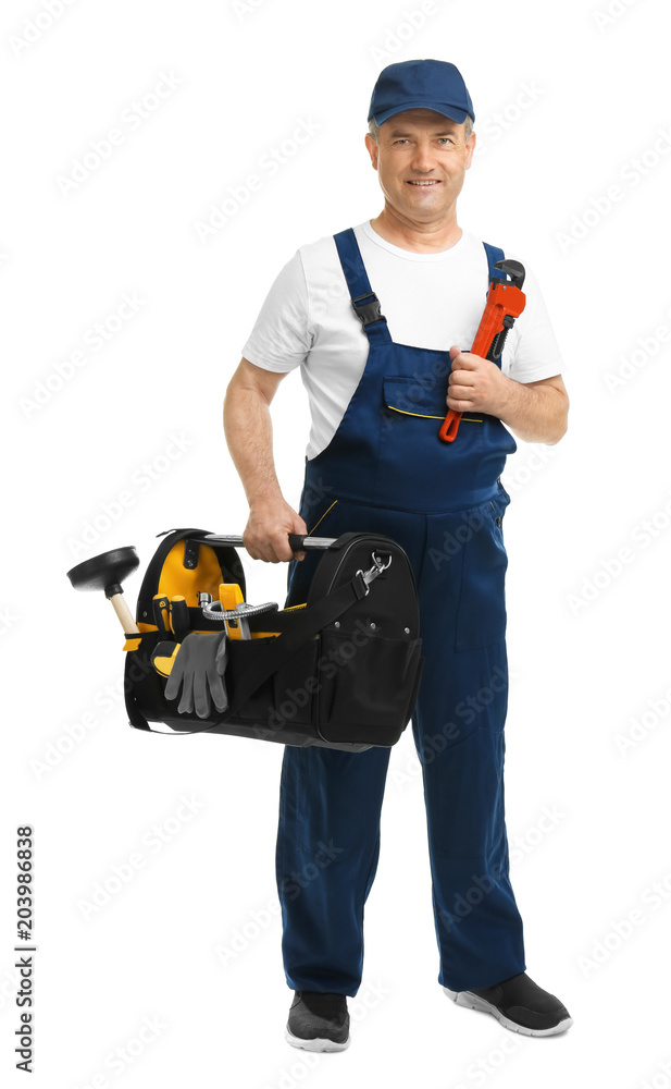 Mature plumber with tool bag on white background Mature plumber with tool bag on white background