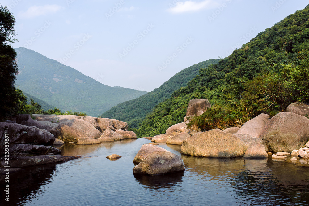 Photo of a mountain river in China.