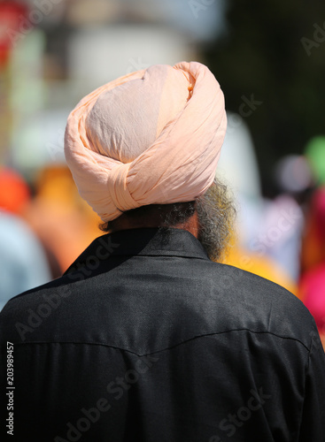 senior sikh man with long beard and turban photo