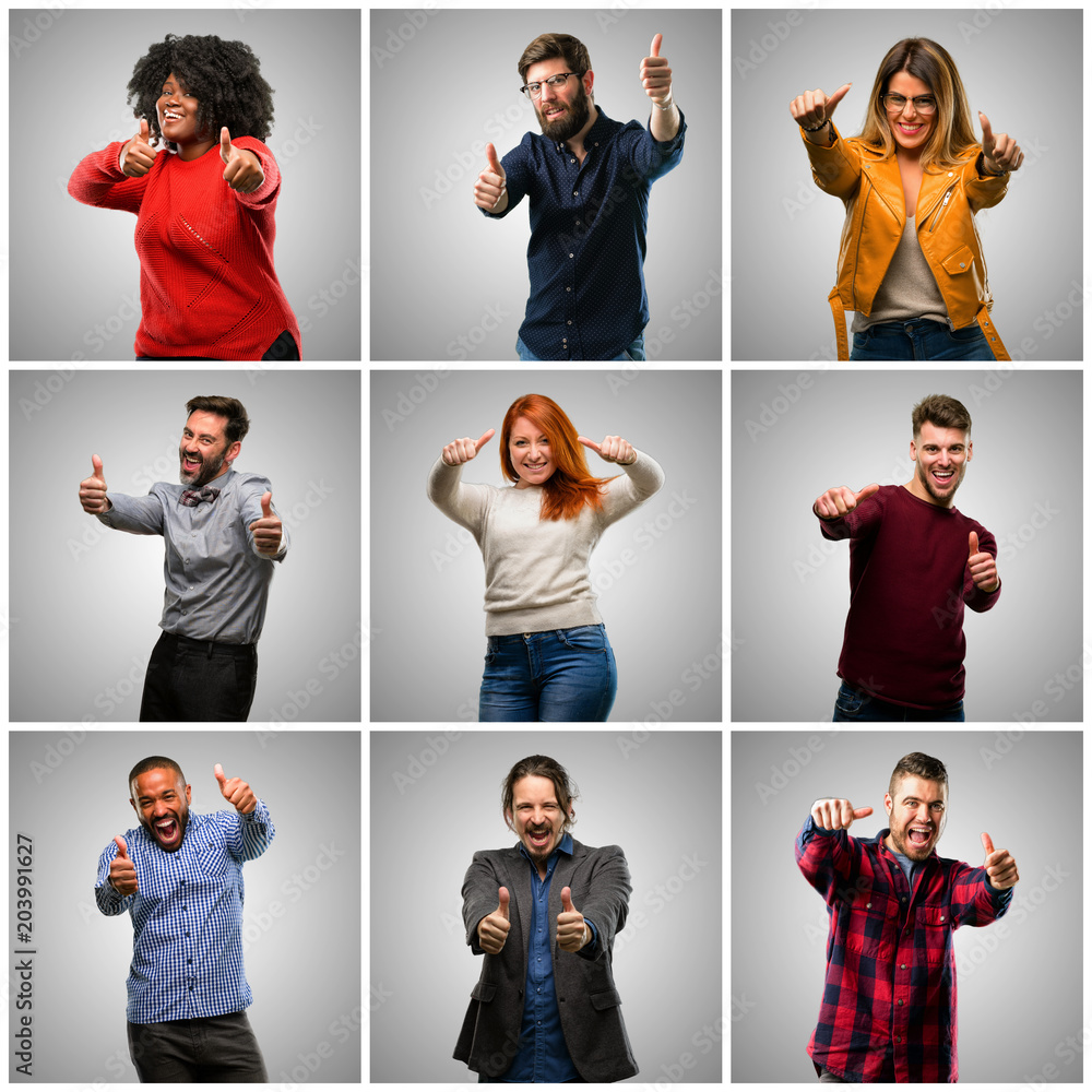 Obraz premium Group of mixed people, women and men stand happy and positive with thumbs up approving with a big smile expressing okay gesture