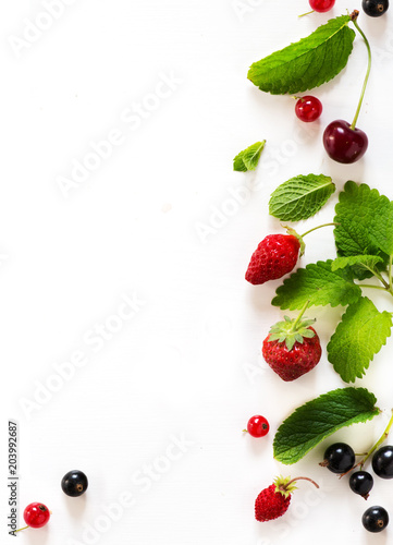 healthy summer fruit food background; sweet fresh fruit on white background