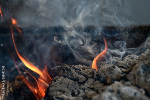 burning and smoking coals
