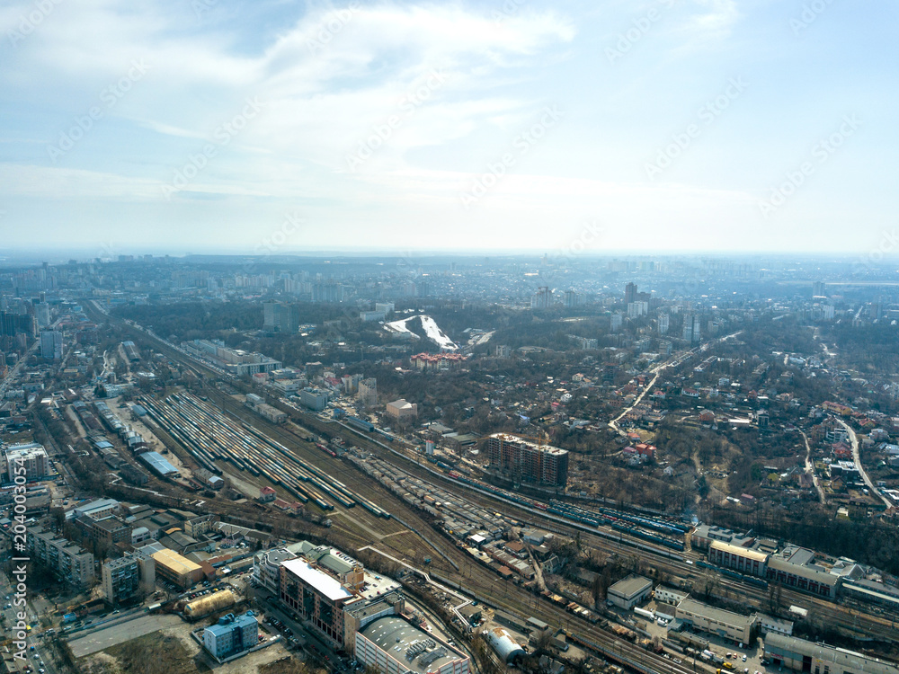 Panoramic view of the city of Kiev and the railway against the blue sky, aerial view