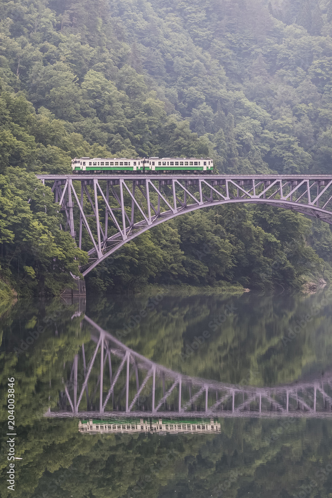 Tadami railway line and Tadami River in summer season at Fukushima prefecture. Tadami railway line and Tadami River in summer season at Fukushima prefecture.