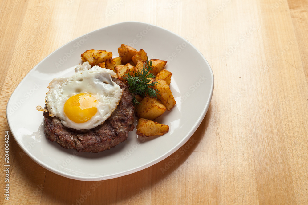 fried meat with egg and potatoes fried meat with egg and potatoes