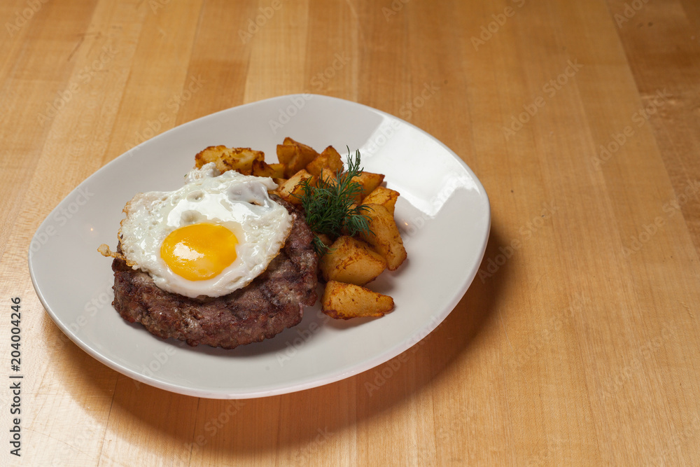 fried meat with egg and potatoes fried meat with egg and potatoes