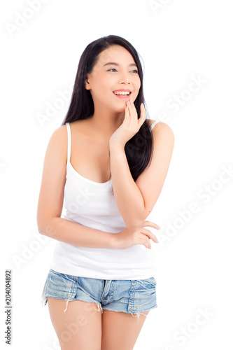 Portrait of beautiful asian woman makeup of cosmetic, girl hand touch cheek and smile attractive, face of beauty perfect with wellness isolated on white background with skin healthcare concept. © N_studio