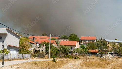 фотографія Series of wildfires in Croatia approaching village