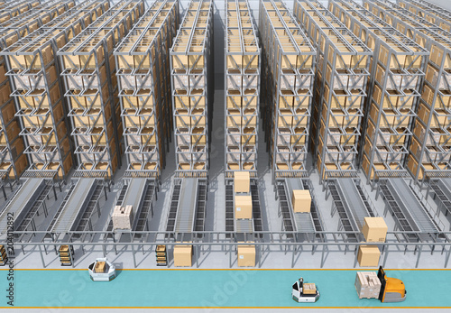 Front view of modern Automated Logistics Center's interior. AGV and autonomous forklift carrying goods. Concept for automated logistics solution.