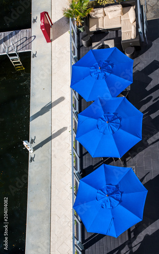 Three Blue Umbrellas