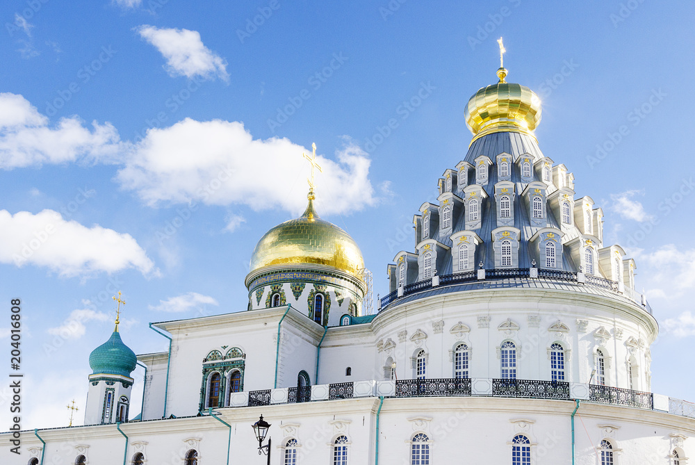 Russian Orthodox monastery church in sunny weather blue sky