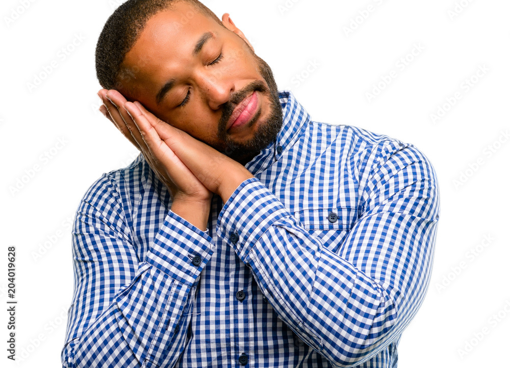 African american man with beard tired and bored, tired because of a long day overworking isolated over white background African american man with beard tired and bored, tired because of a long day overworking isolated over white background