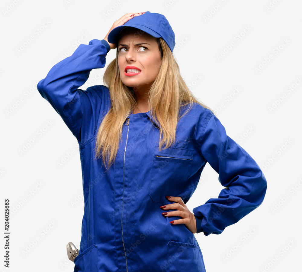 Young plumber woman doubt expression, confuse and wonder concept, uncertain future Young plumber woman doubt expression, confuse and wonder concept, uncertain future