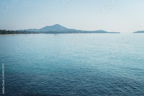 Travel on the island sea the beach Waves and fishing boats