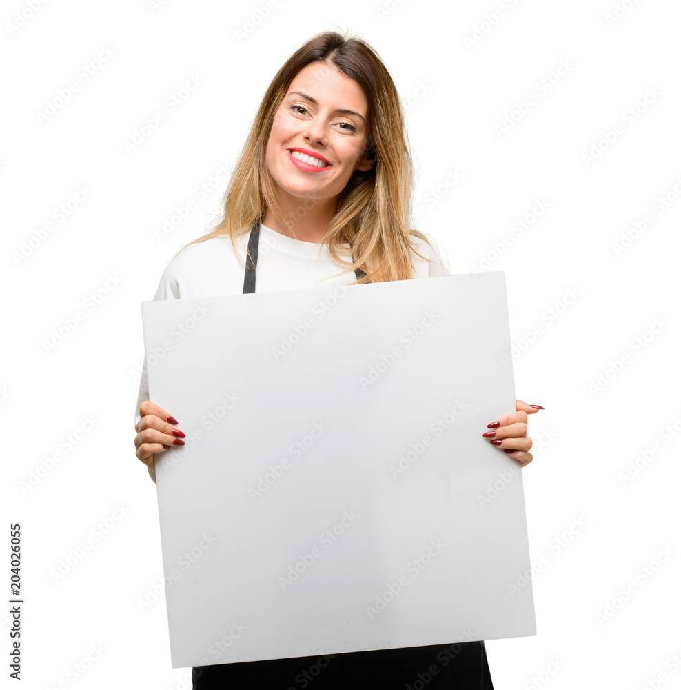 Shop owner woman wearing apron holding blank advertising banner, good poster for ad, offer or announcement, big paper billboard Shop owner woman wearing apron holding blank advertising banner, good poster for ad, offer or announcement, big paper billboard