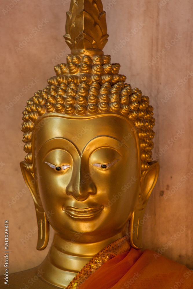 head of gold image buddha in the old temple Ayutthaya, Thailand 