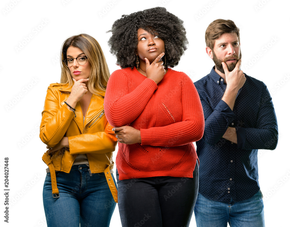 Group of three young men and women doubt expression, confuse and wonder concept, uncertain future Group of three young men and women doubt expression, confuse and wonder concept, uncertain future