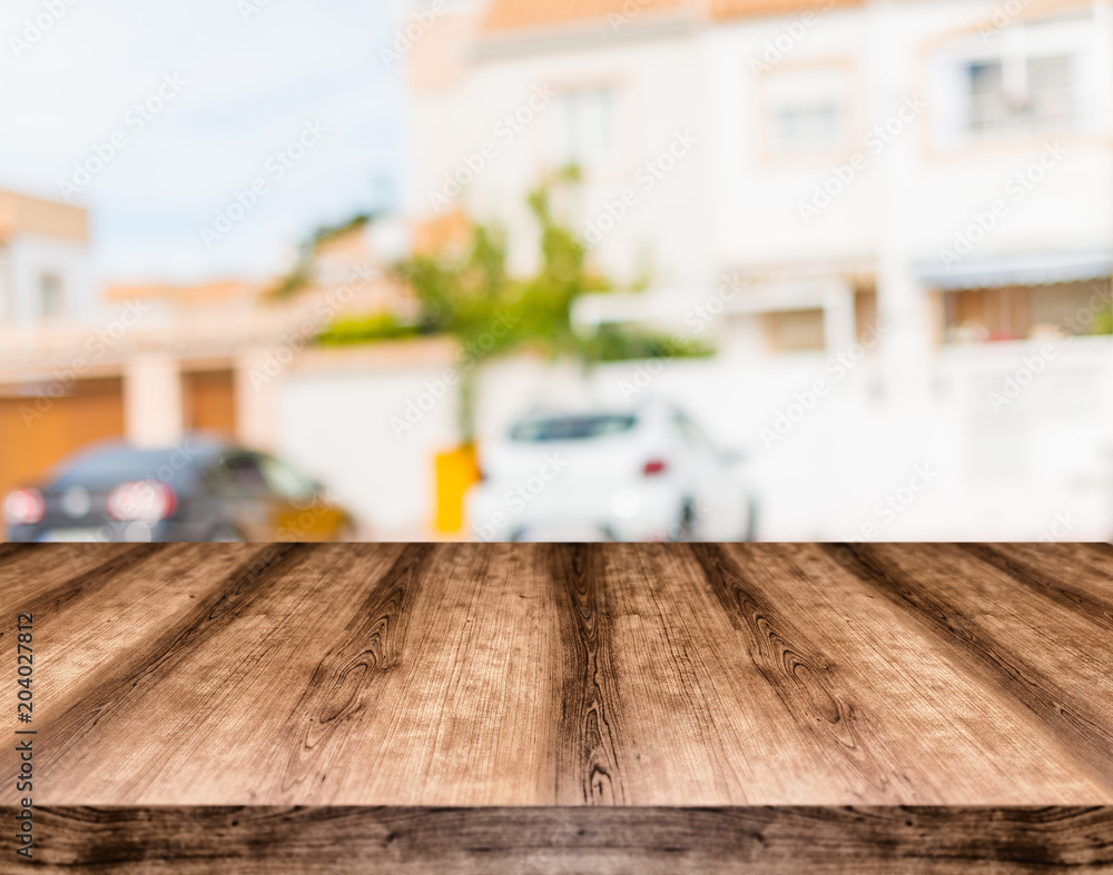 Wooden empty table board in front of blurred background. Can be used for display or montage any product. Mock up for display your product. Wooden empty table board in front of blurred background. Can be used for display or montage any product. Mock up for display your product.