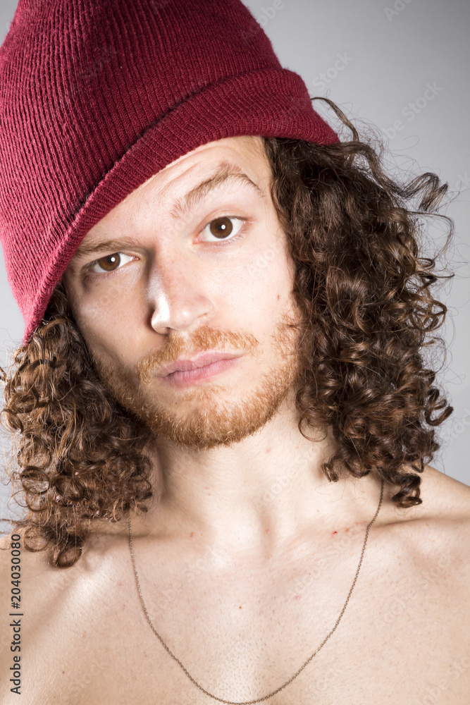 Young ginger topless man studio portrait Young ginger topless man studio portrait