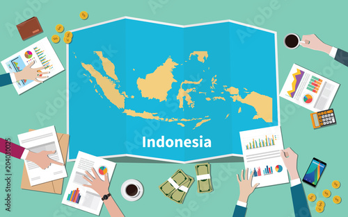 indonesia country growth nation team discuss with fold maps view from top