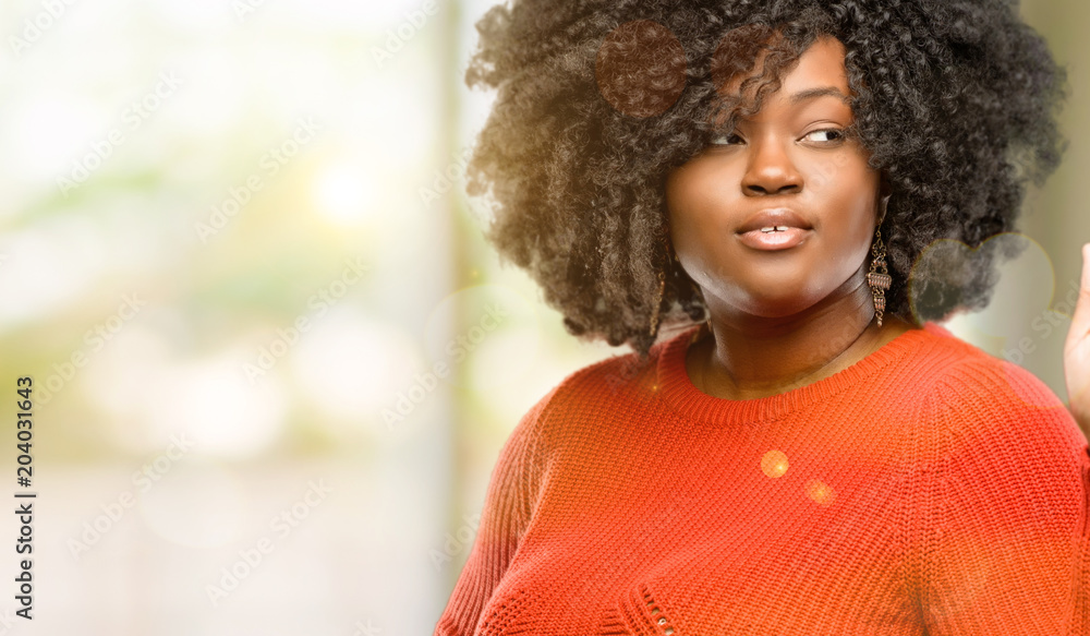 Beautiful african woman raising his finger, is the number one, outdoor Beautiful african woman raising his finger, is the number one, outdoor