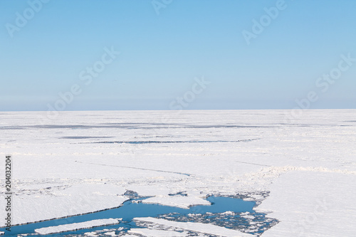 The frozen sea, covered with ice