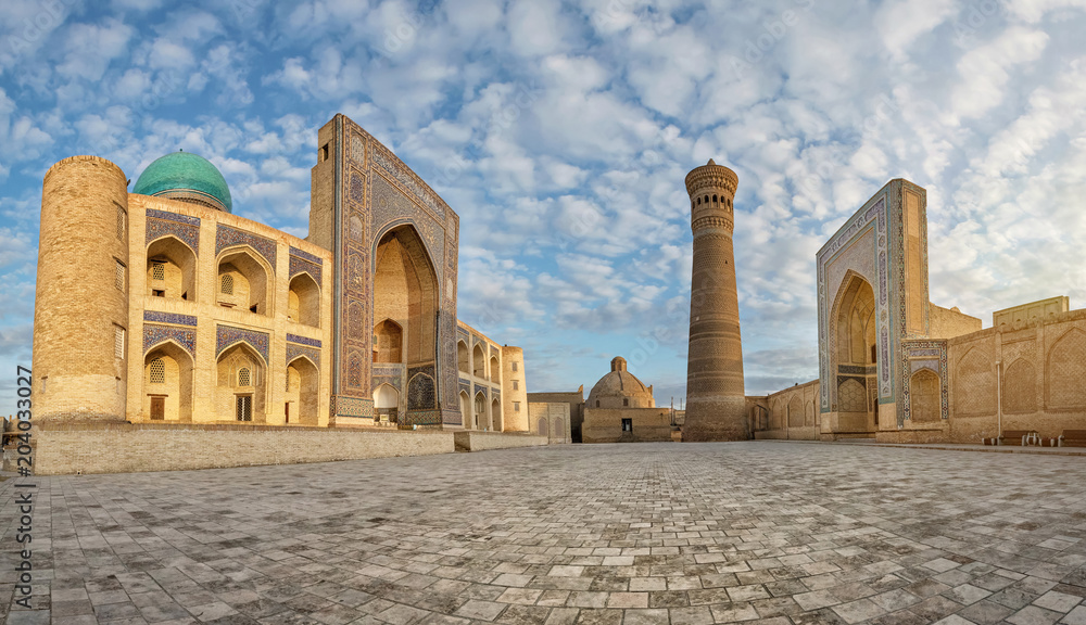 Panoramic view of Poi Kalan - an islamic religious complex located around the Kalan minaret in Bukhara, Uzbekistan