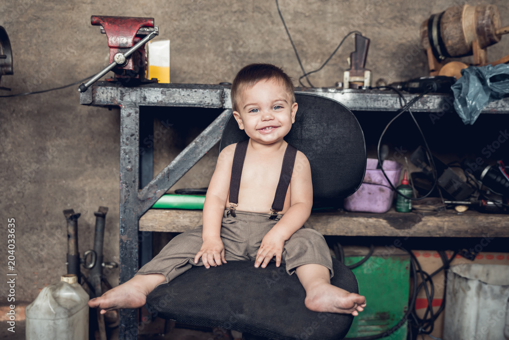 Mechanic Baby Boy - Sitting on the chair.