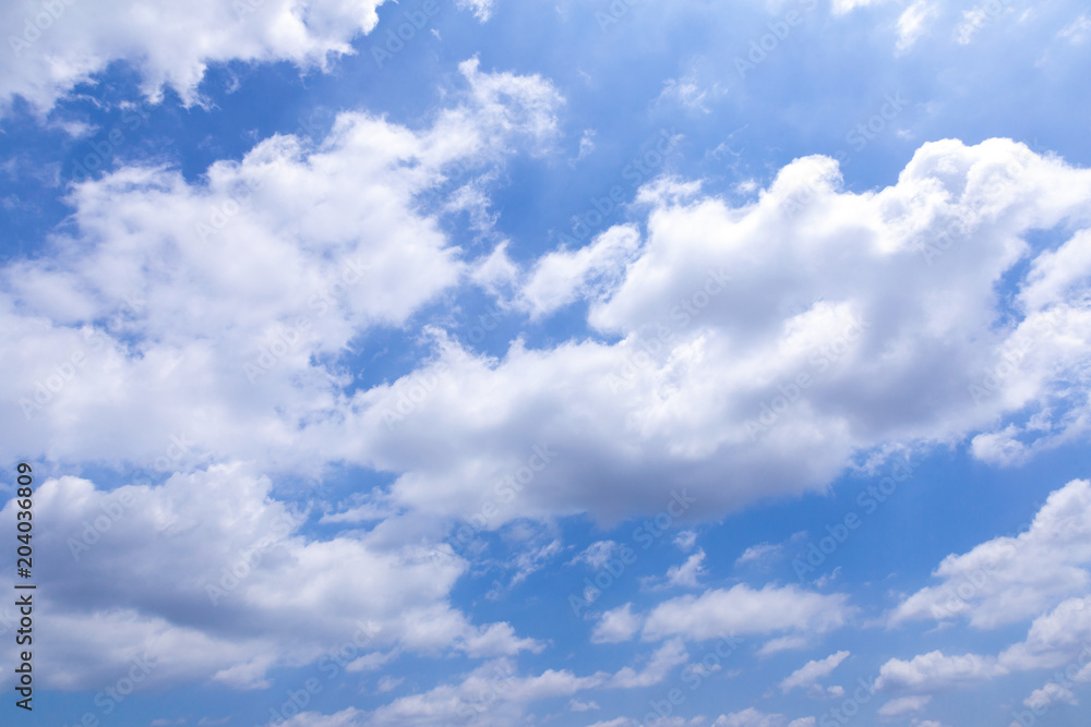 Blue sky background with white clouds, rain clouds on sunny summer or spring day. Blue sky background with white clouds, rain clouds on sunny summer or spring day.