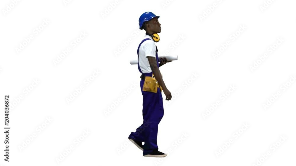 African American engineer goes carries a drawing of the building. Alpha channel . Side view African American engineer goes carries a drawing of the building. Alpha channel . Side view