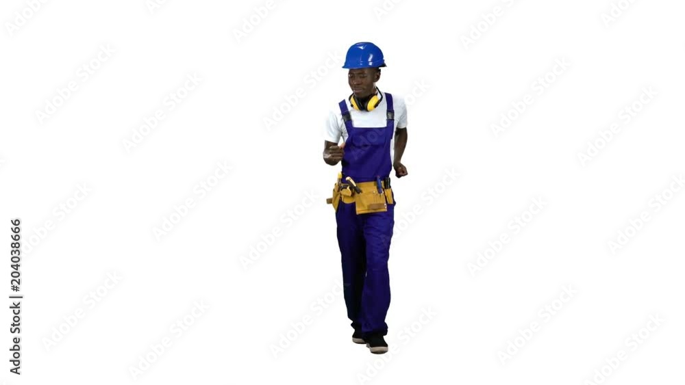 Builder of african american appearance dances on the move . Alpha channel Builder of african american appearance dances on the move . Alpha channel