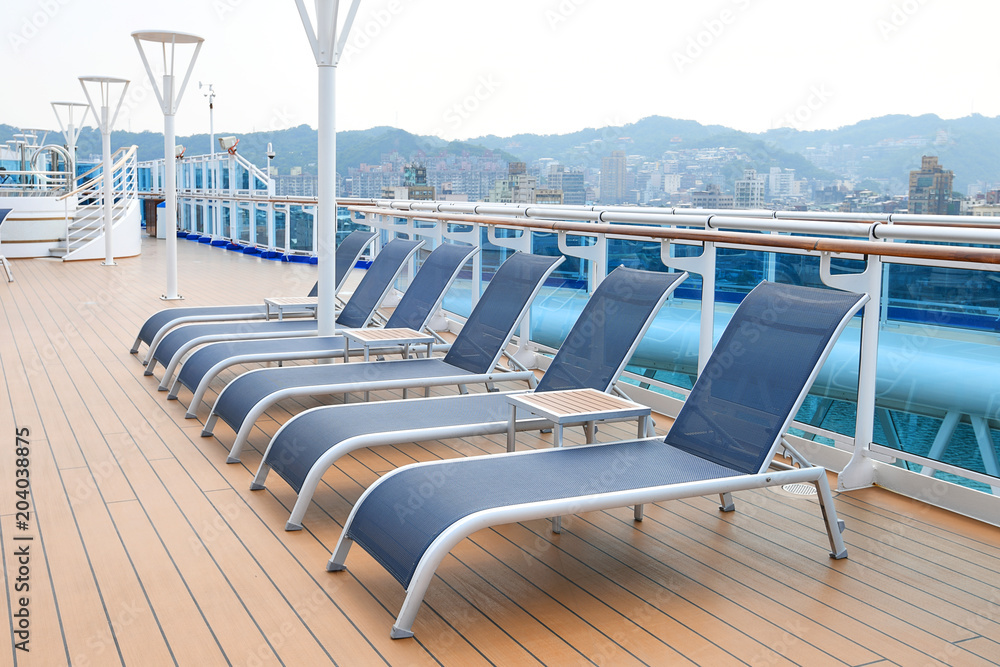 Fototapeta premium Beach chairs on the deck