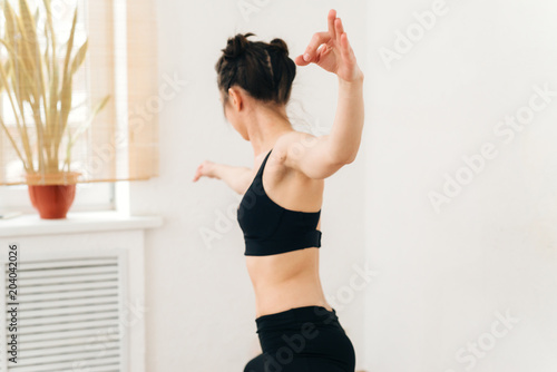 Young attractive girl do yoga