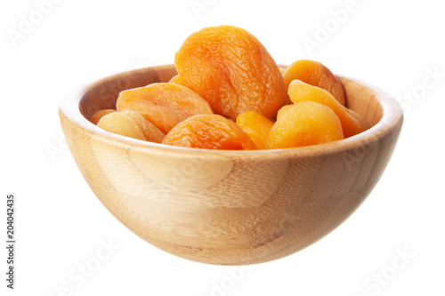 Dried apricots on white