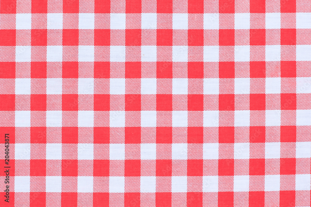 Red classic checkered tablecloth texture, background with copy space Red classic checkered tablecloth texture, background with copy space
