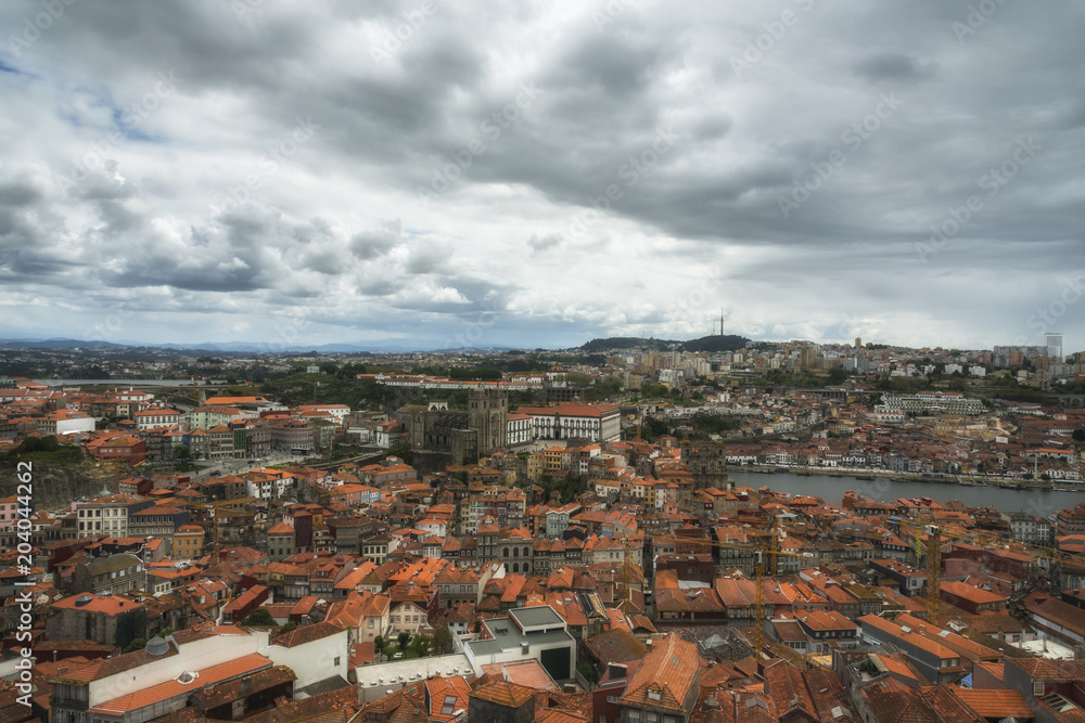 Aerial view of Porto and Douro River from Clerigos Tower. Red roofs. Porto, Portugal.