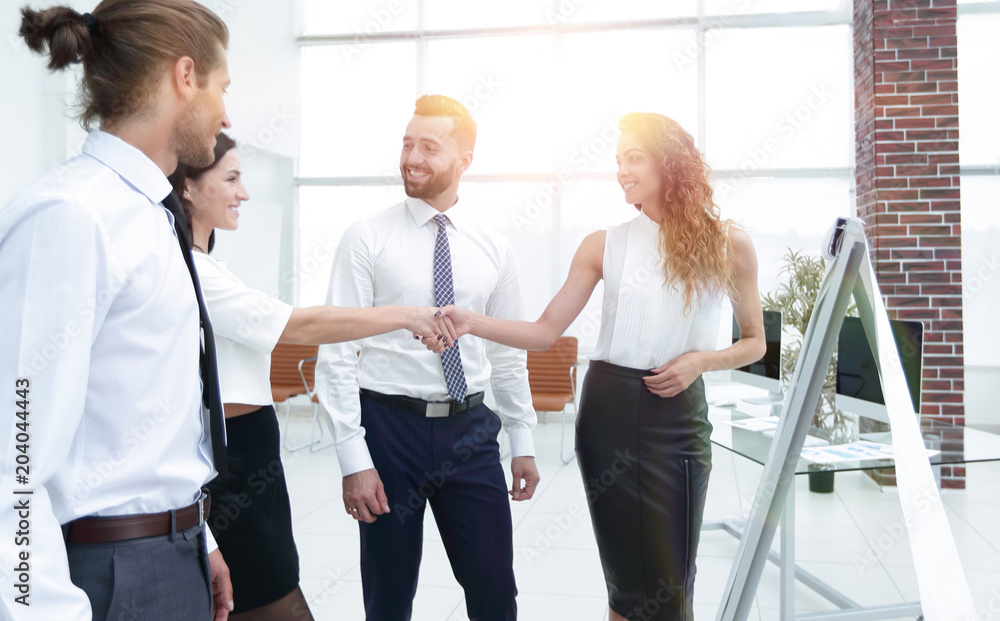 Fototapeta premium business women greet each other with a handshake
