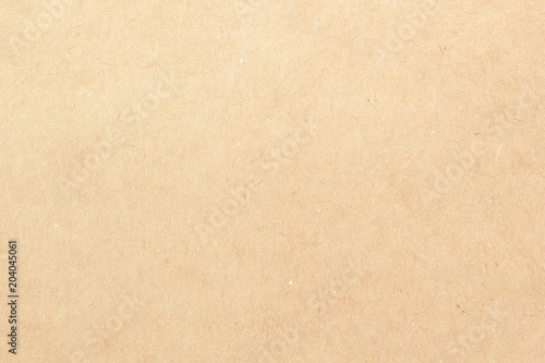 Brown craft cardboard paper sheet of recycle paper background and texture. 