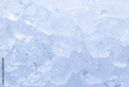 Ice cubes close-up background © saranyoo