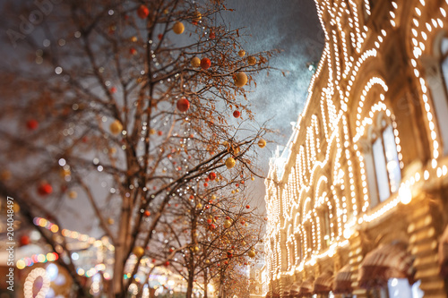 Moscow, Russia. Christmas decorations on the trees near the GUM © rzrs
