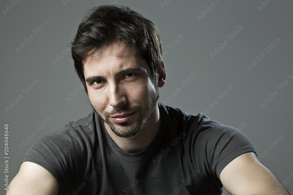 Obraz premium Portrait of a young man in studio
