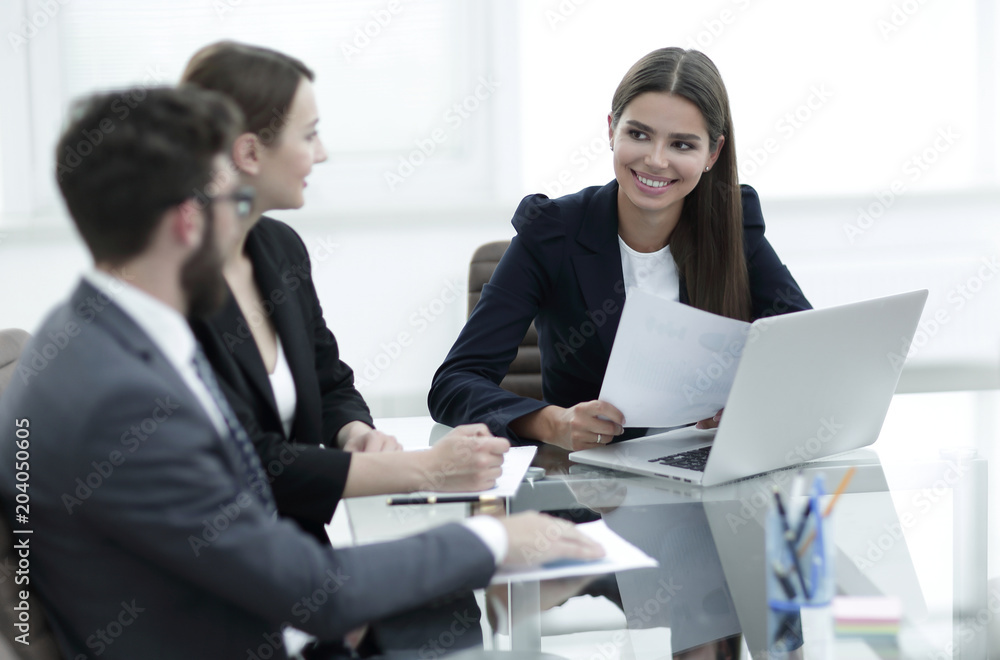 business partners discussing documents and ideas at meeting business partners discussing documents and ideas at meeting