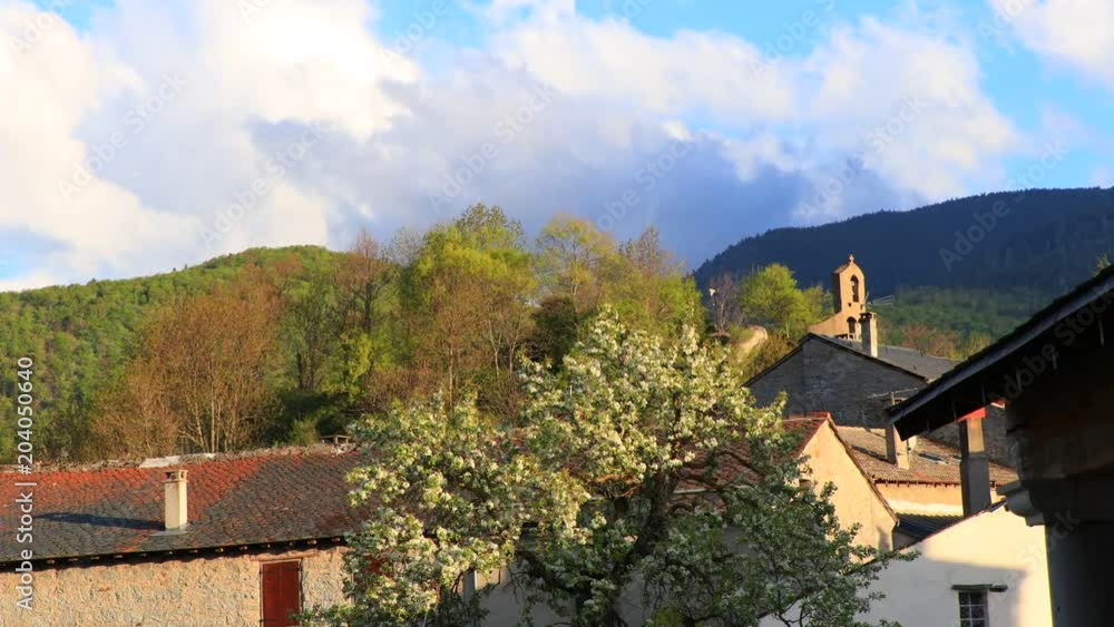 Time lapse of pyrenean village with bell tower in Languedoc, Aude in south of France
Time lapse of pyrenean village with bell tower in Languedoc, Aude in south of France