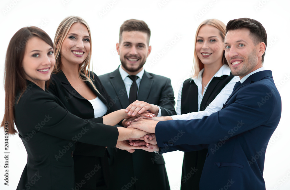 friendly business team with hands clasped together. friendly business team with hands clasped together.