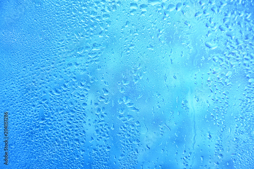 Water drops in the glass surface