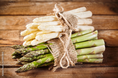 Spring harvest of fresh green and white asparagus